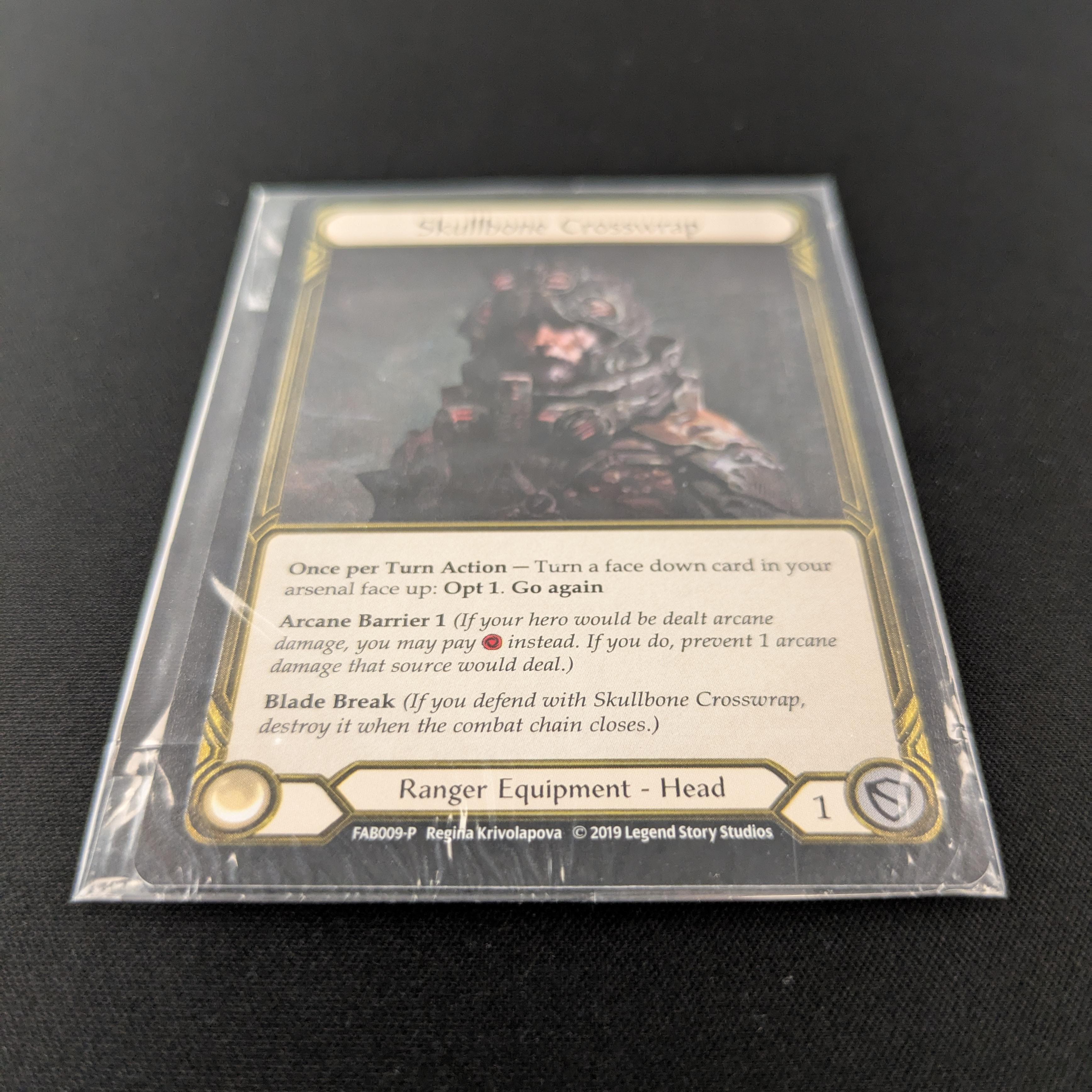 FAB Singles - Skullbone Crosswrap (Cold Foil Golden) - FAB009-P - FAB Promos - NM - 