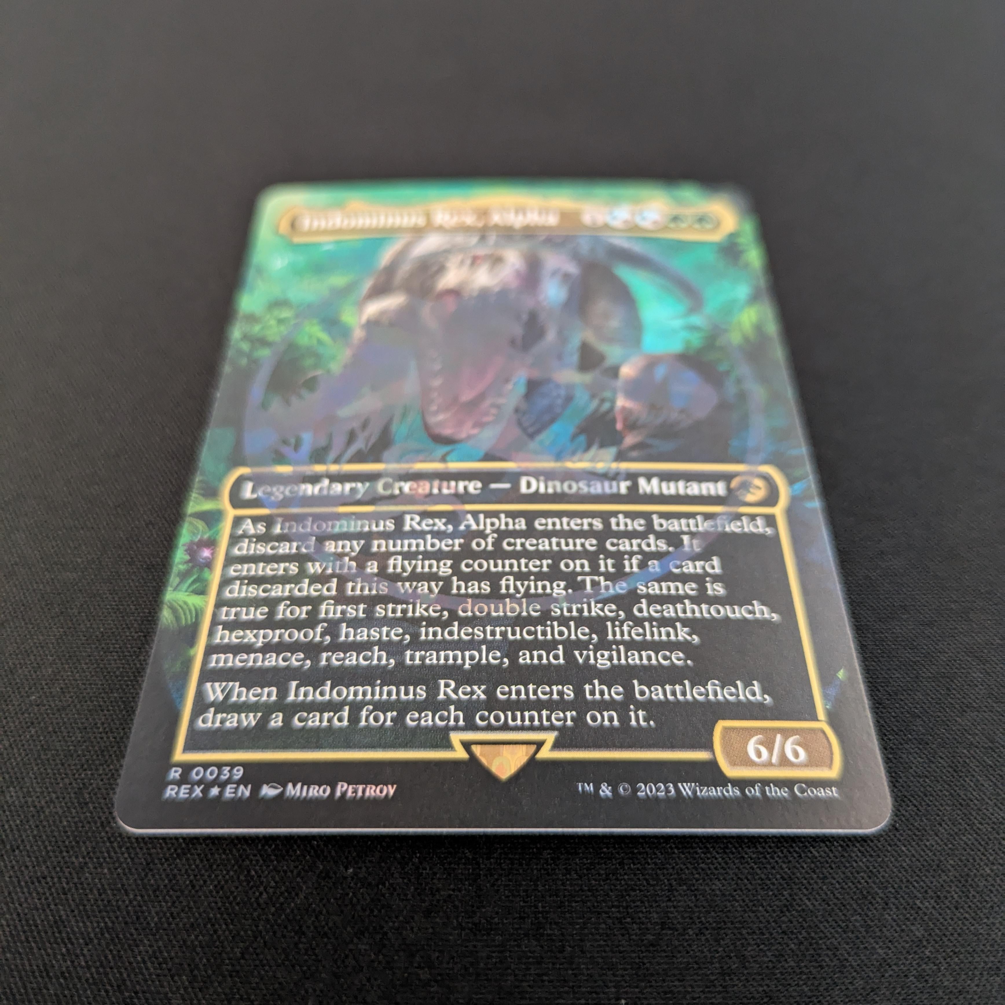 MTG Singles - [FOIL] Indominus Rex, Alpha (Emblem Foil) - Universes Beyond: Jurassic World Collection - NM - 