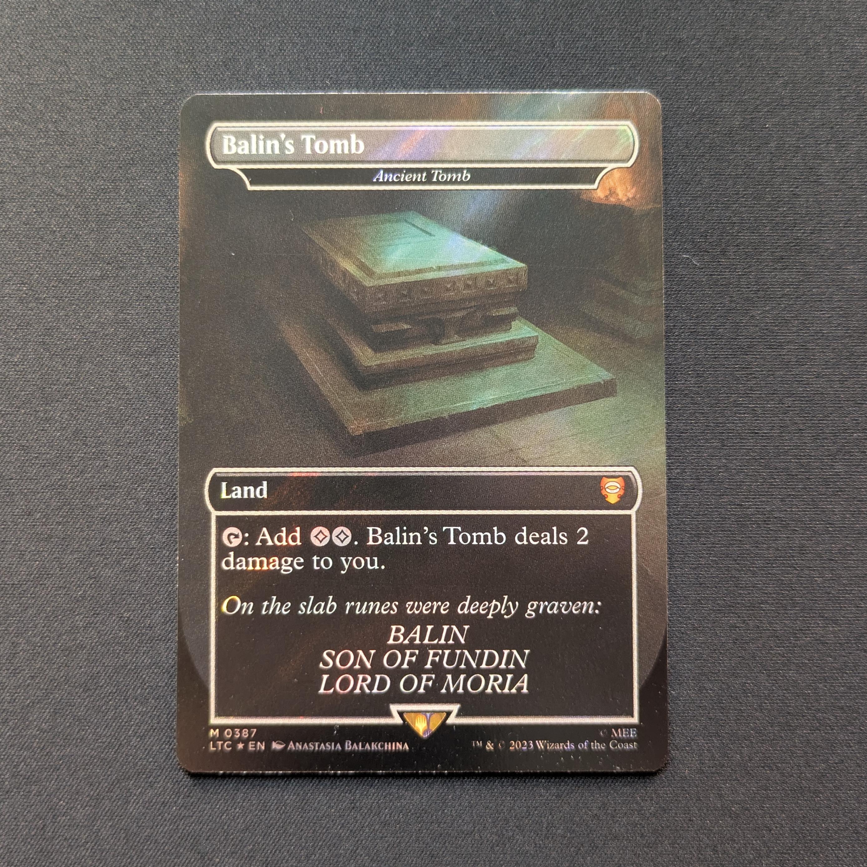 MTG Singles - [FOIL] Ancient Tomb (Surge Foil) - Commander: The Lord of the Rings: Tales of Middle-earth: Extras - NM - 