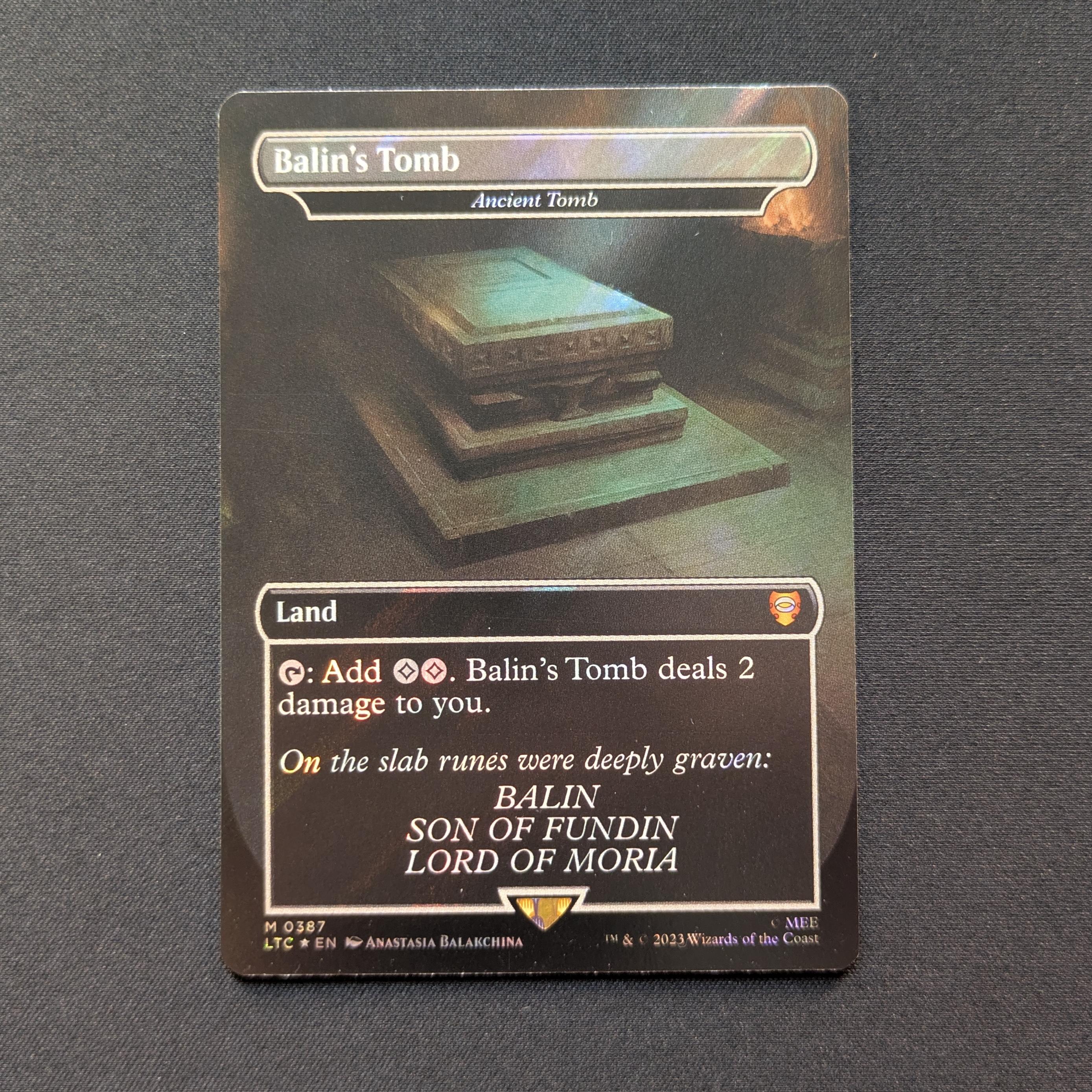 MTG Singles - [FOIL] Ancient Tomb (Surge Foil) - Commander: The Lord of the Rings: Tales of Middle-earth: Extras - NM - 