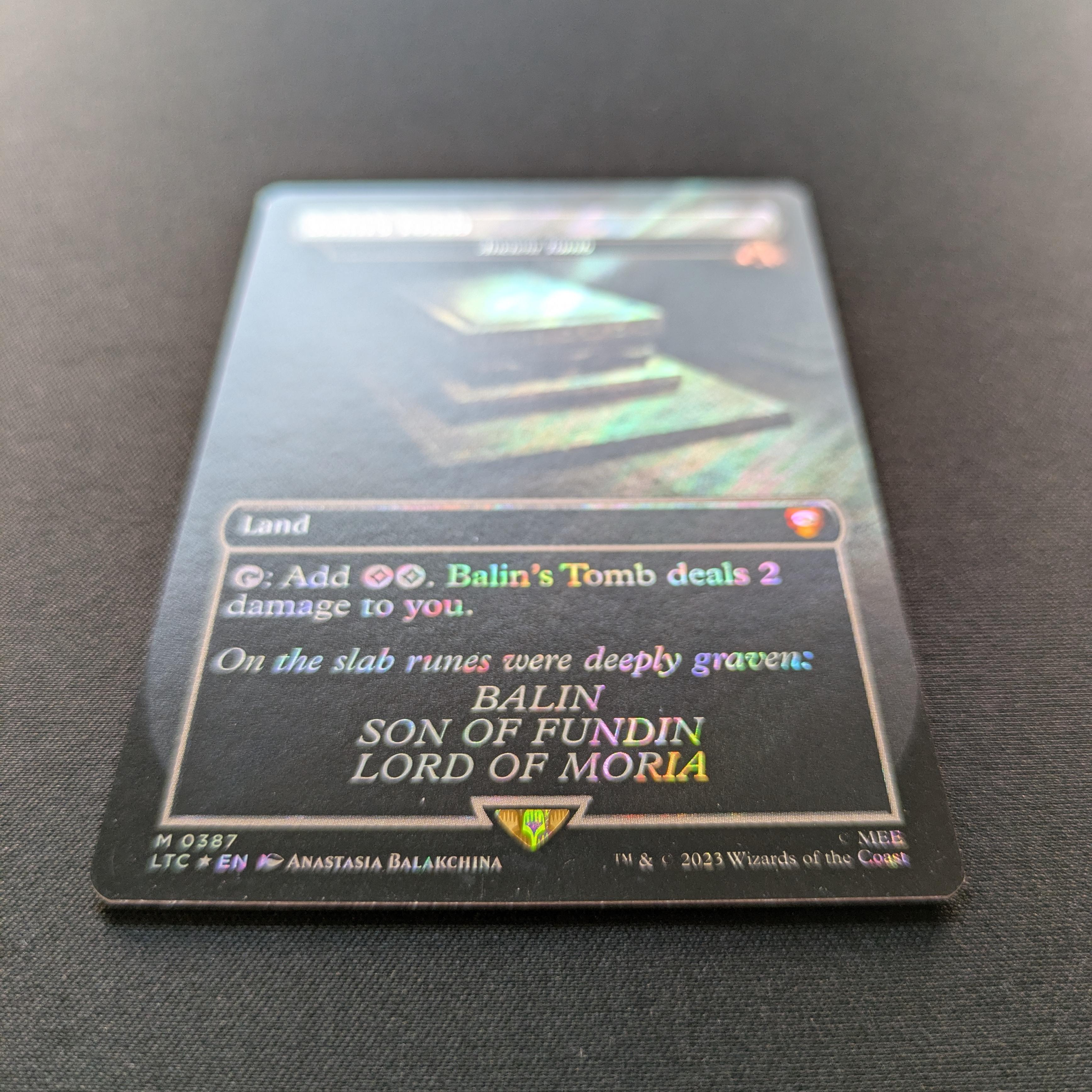 MTG Singles - [FOIL] Ancient Tomb (Surge Foil) - Commander: The Lord of the Rings: Tales of Middle-earth: Extras - NM - 