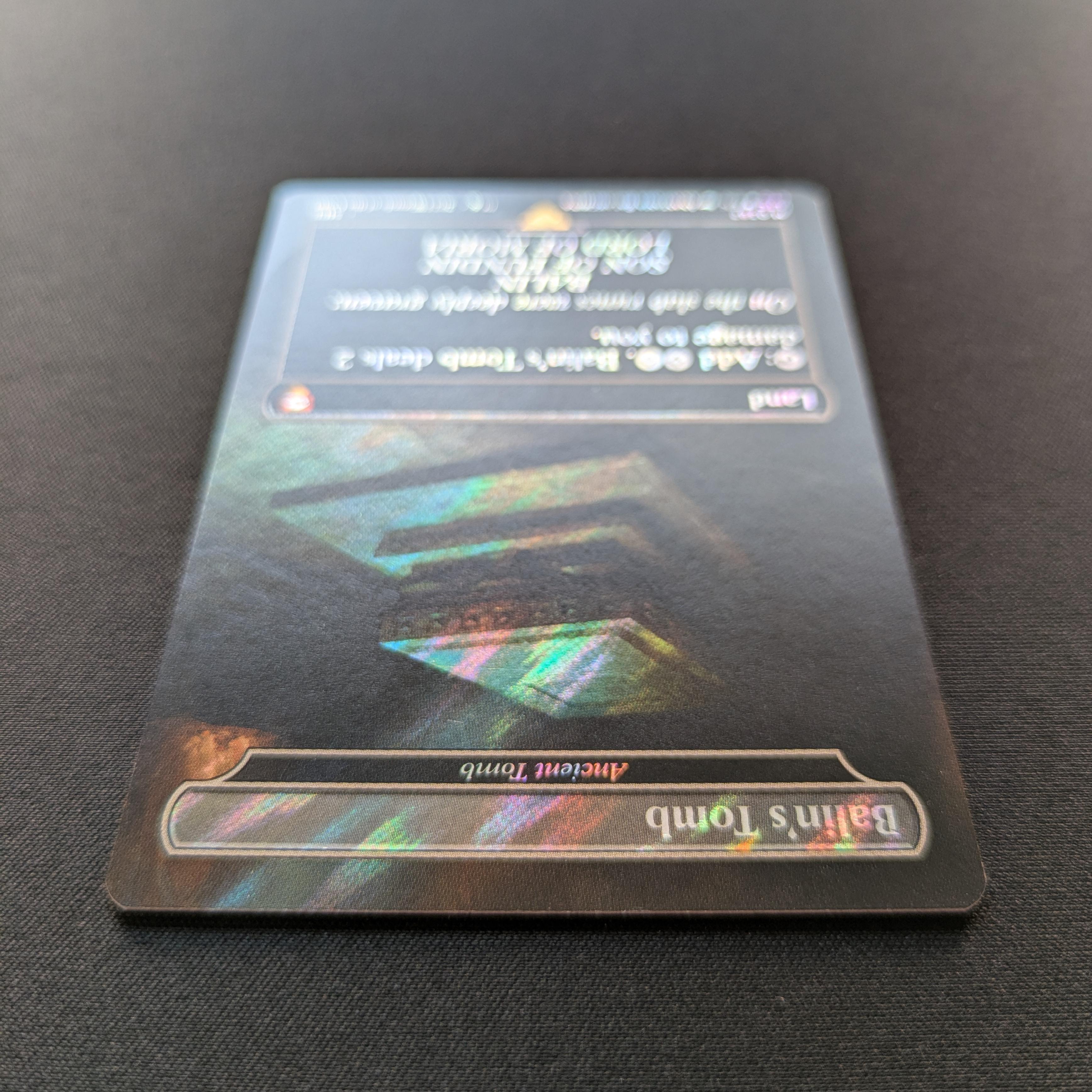 MTG Singles - [FOIL] Ancient Tomb (Surge Foil) - Commander: The Lord of the Rings: Tales of Middle-earth: Extras - NM - 