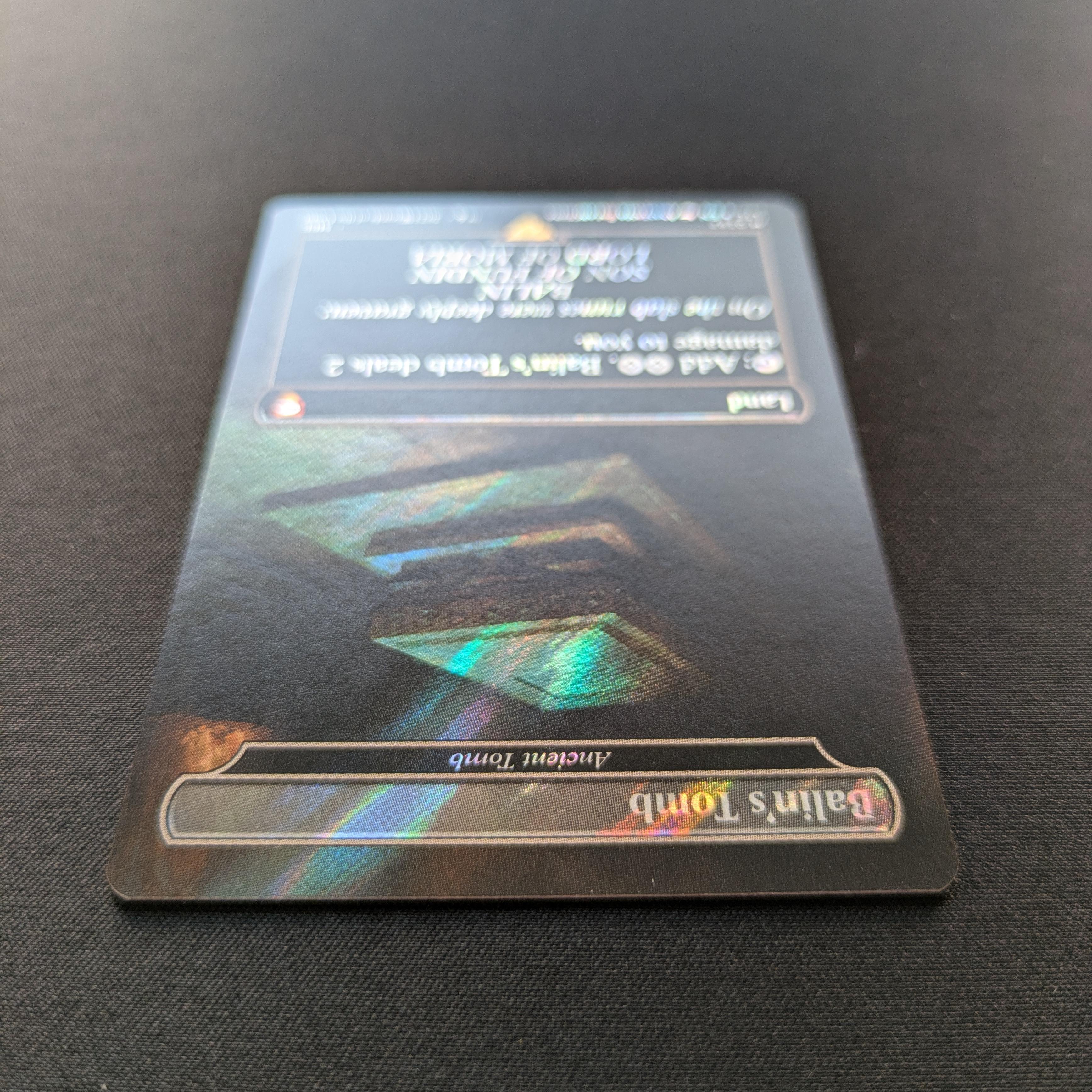 MTG Singles - [FOIL] Ancient Tomb (Surge Foil) - Commander: The Lord of the Rings: Tales of Middle-earth: Extras - NM - 