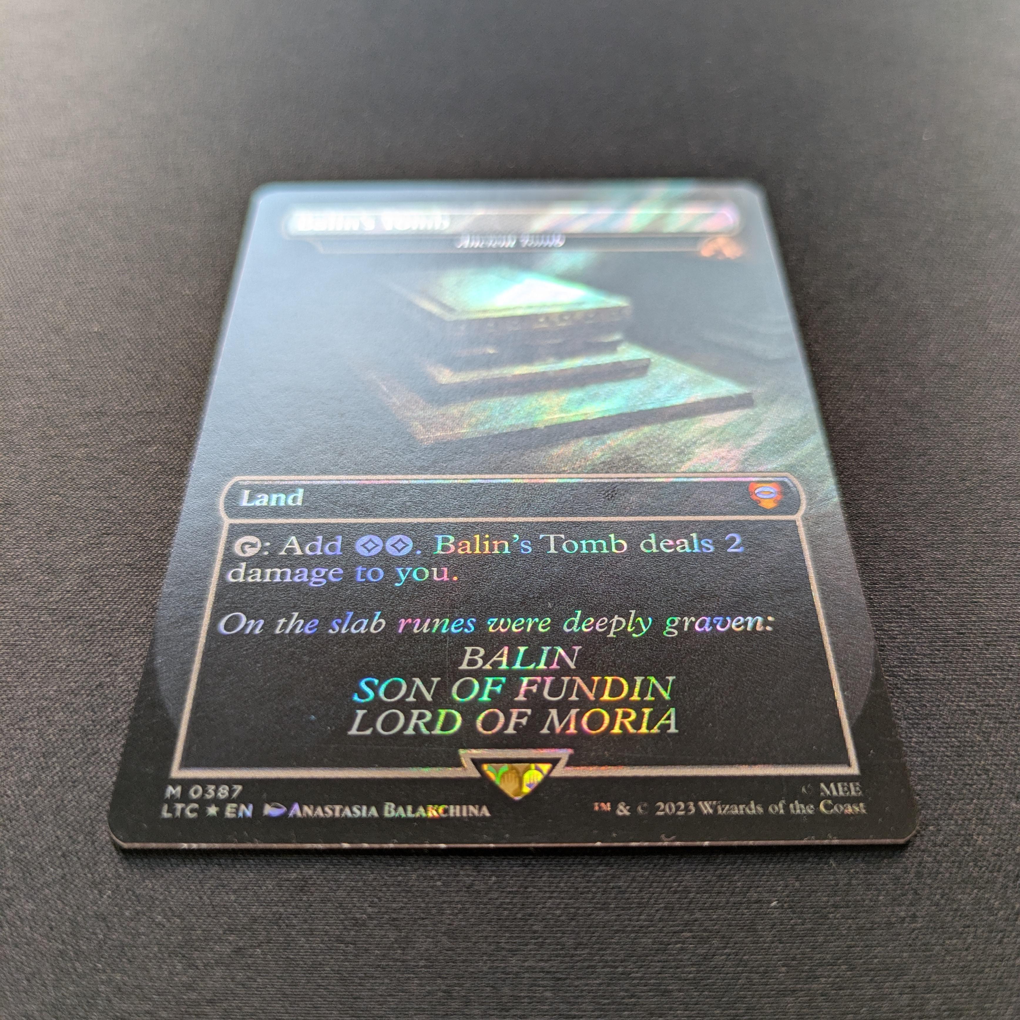 MTG Singles - [FOIL] Ancient Tomb (Surge Foil) - Commander: The Lord of the Rings: Tales of Middle-earth: Extras - NM - 