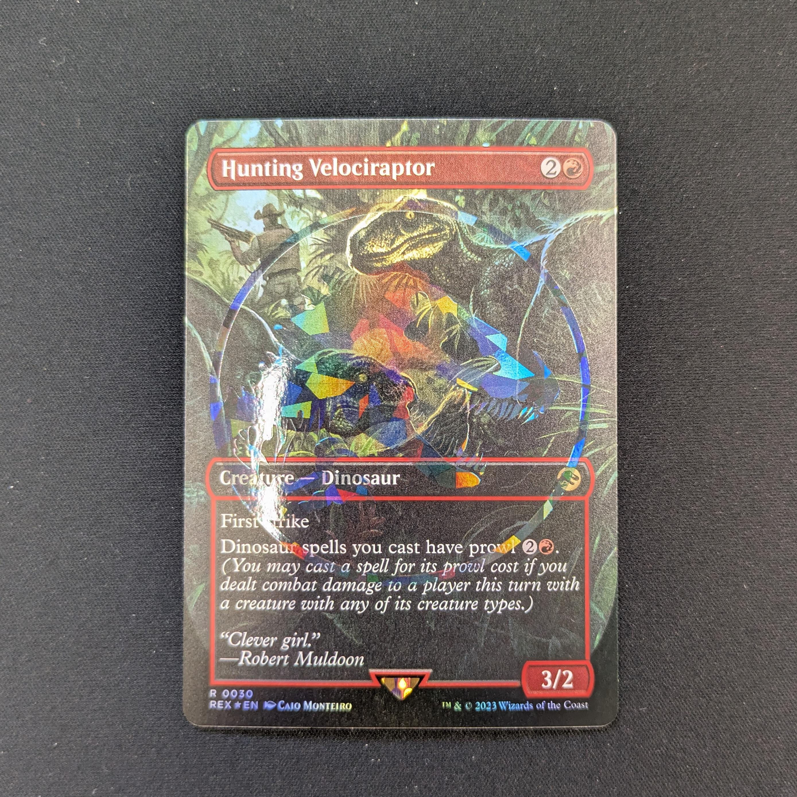 [FOIL] Hunting Velociraptor (Emblem Foil) - Universes Beyond: Jurassic World Collection - NM