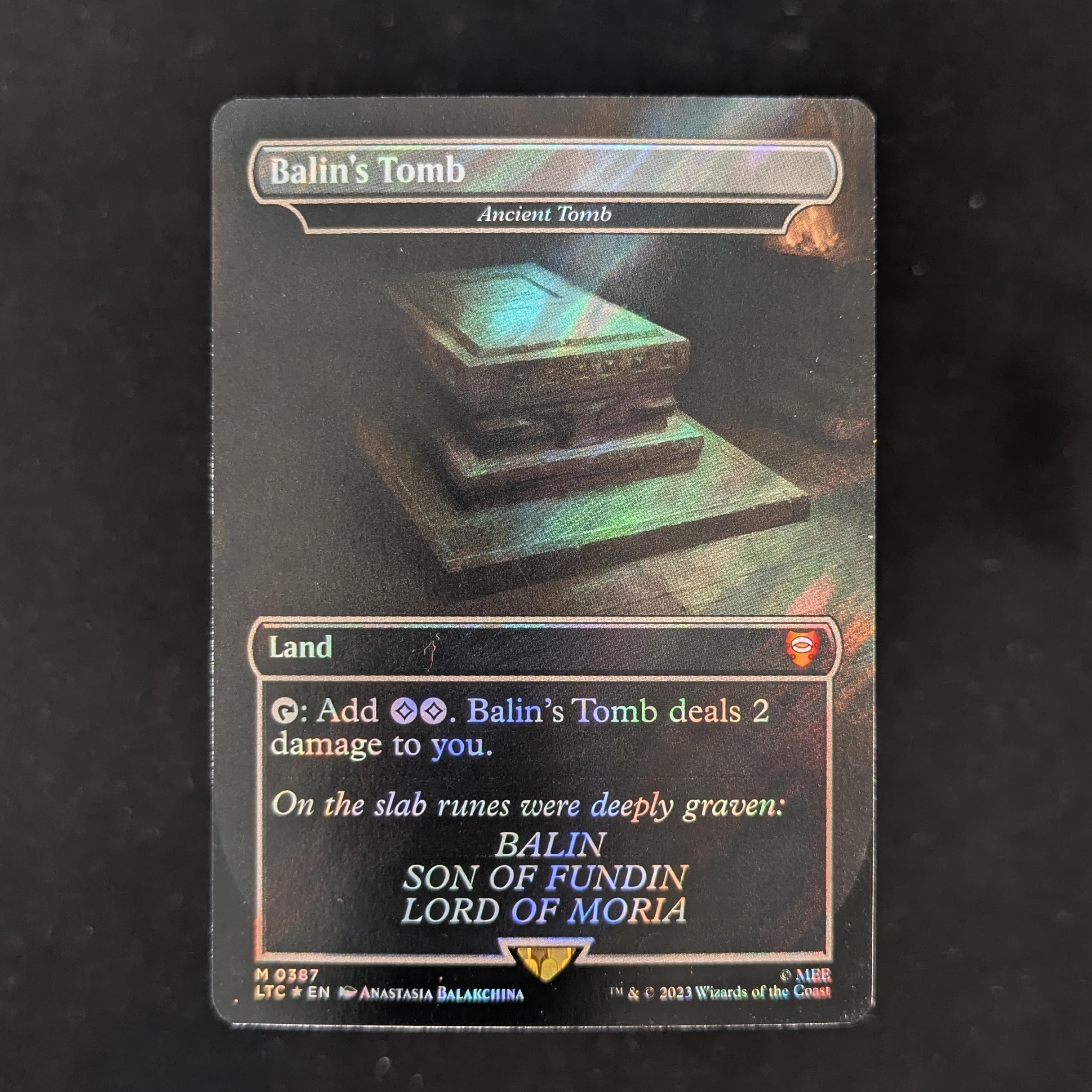 MTG Singles - [FOIL] Ancient Tomb (Surge Foil) - Commander: The Lord of the Rings: Tales of Middle-earth: Extras - NM - 