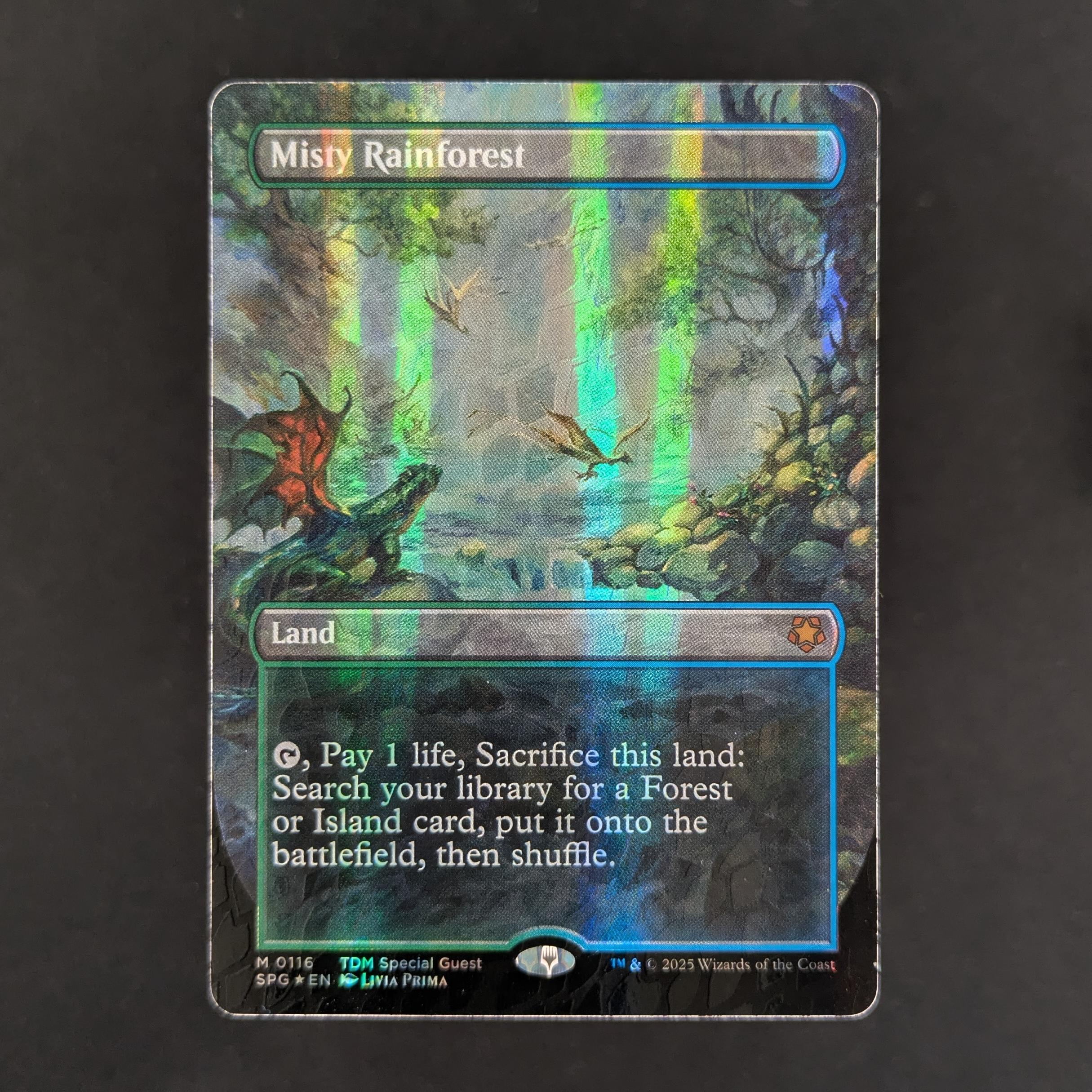 [FOIL] Misty Rainforest (Dragonscale Foil) - Commander: The Lord of the Rings: Tales of Middle-earth: Extras - NM
