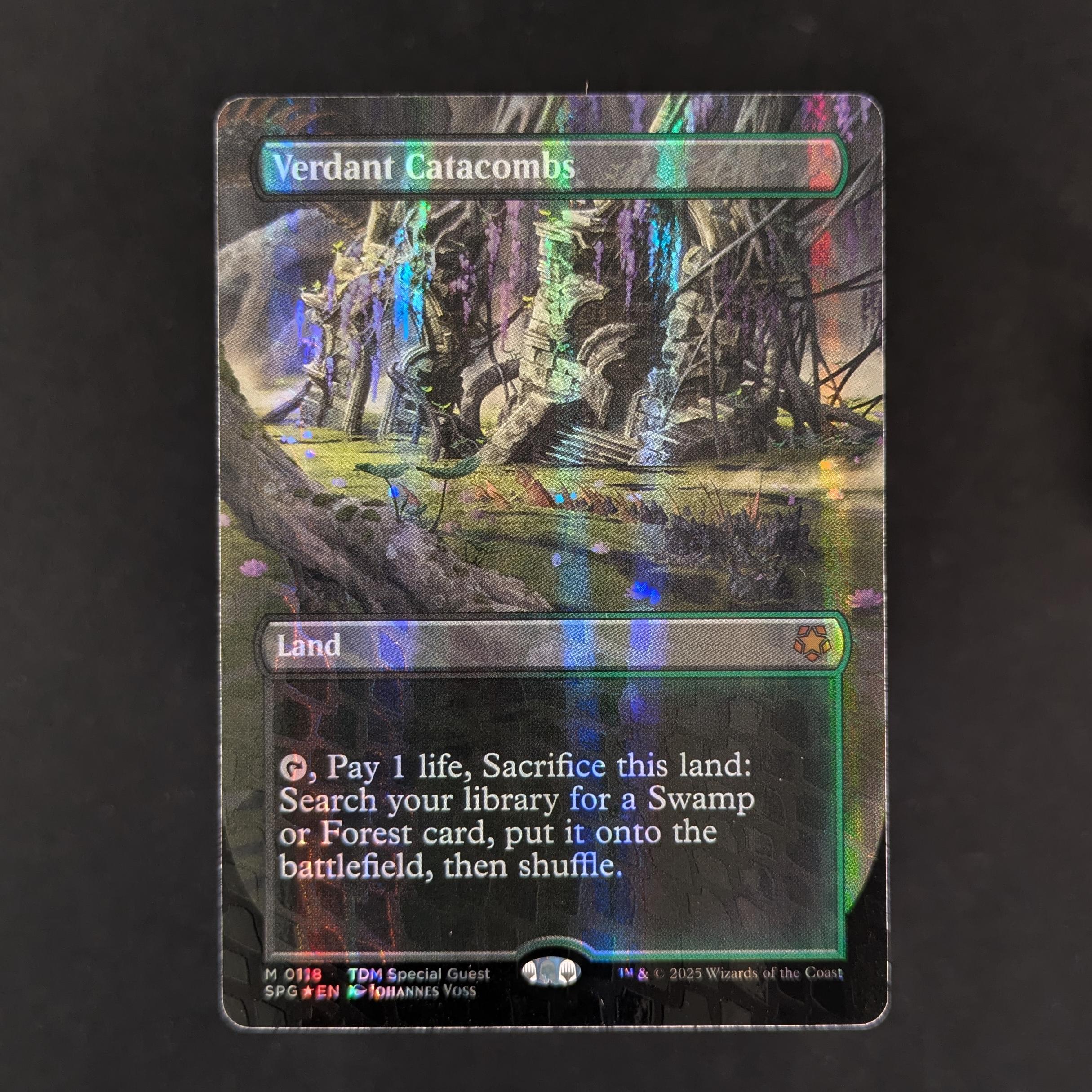 [FOIL] Verdant Catacombs (Borderless) (Dragonscale Foil) - Special Guests - English - NM