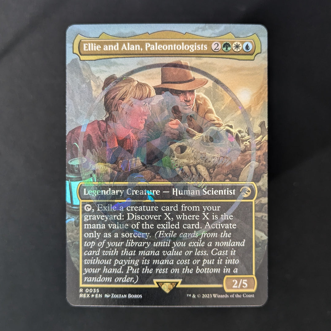 FOIL] Ellie and Alan, Paleontologists (Borderless) (Emblem)