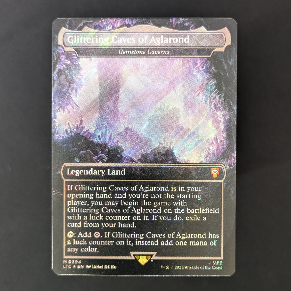 [FOIL] Glittering Caves of Aglarond - Gemstone Caverns (Surge Foil) - Commander: The Lord of the Rings: Tales of Middle-earth: Extras - English - NM