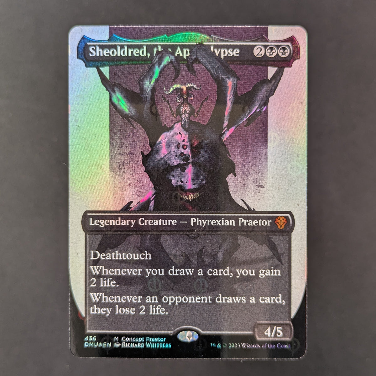 [FOIL] Sheoldred, the Apocalypse (Concept Praetor) (Step-And-Compleat Foil) - Phyrexia: All Will Be One: Extras - English - NM